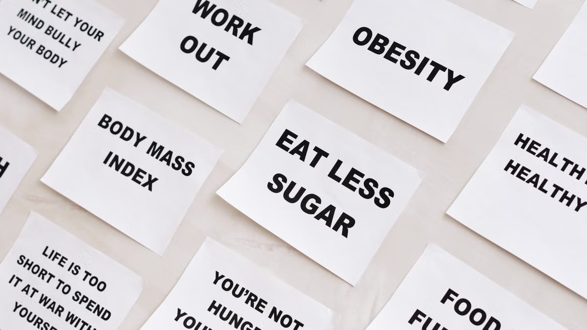 Collection of motivational notes promoting health and wellness found on paper notes.